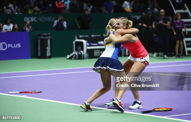 Timea Babos of Hungary and Andrea Hlavackova of Czech Republic celebrate victory in the Doubles Final against Johanna Larsson of Sweden and Kiki...