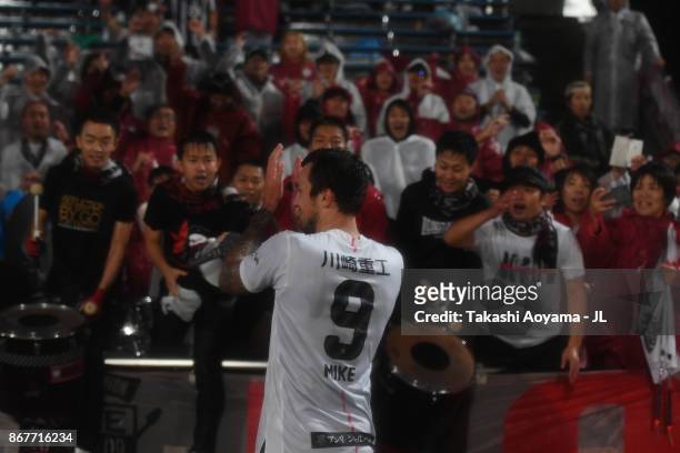 Mike Havenaar of Vissel Kobe high fives with supporters after his side's 3-2 victory in the J.League J1 match between Ventforet Kofu and Vissel Kobe...