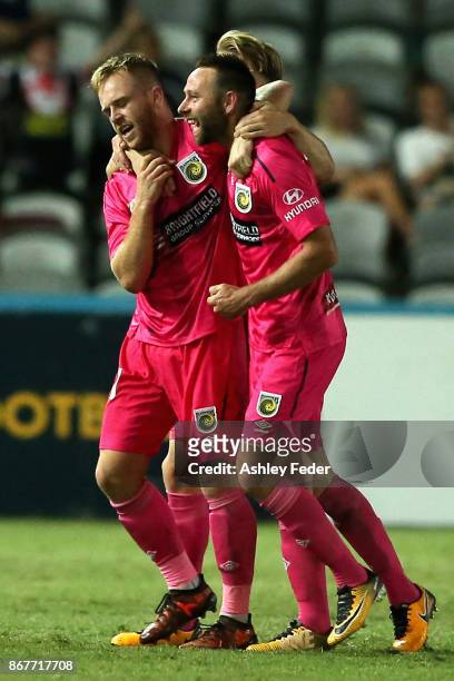 Connor Pain on the Mariners celebrates his goal with team mate Joshua Rose of the Mariners during the round four A-League match between the Central...