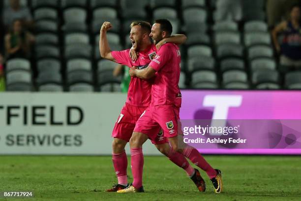 Connor Pain on the Mariners celebrates his goal with team mate Joshua Rose of the Mariners during the round four A-League match between the Central...