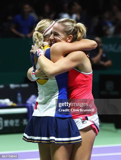 Timea Babos of Hungary and Andrea Hlavackova of Czech Republic celebrate victory in the Doubles Final against Johanna Larsson of Sweden and Kiki...