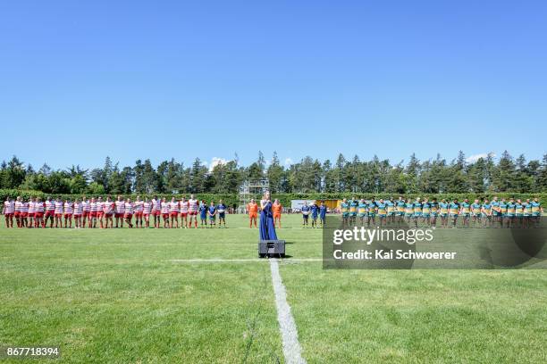 West Coast and Mid Canterbury line up for the national anthem prior to the Mitre 10 Heartland Championship Lochore Cup Final match between Mid...