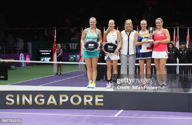 Legend Ambassador Martina Navratilova poses with runners up Kiki Bertens of Netherlands and Johanna Larsson of Sweden and winners Andrea Hlavackova...