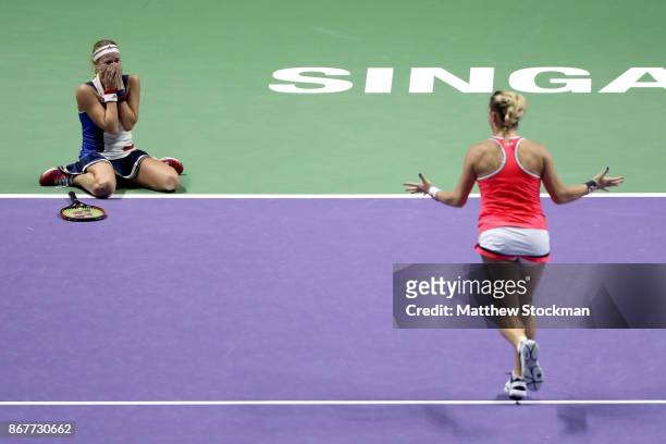 Andrea Hlavackova of Czech Republic and Timea Babos of Hungary celebrate victory in the Doubles Final against Johanna Larsson of Sweden and Kiki...