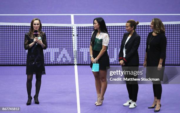 Martina Hingis of Switzerland talks with Chan Yung-Jan of Chinese Taipei and WTA Legend Ambassadors Iva Majoli and Mary Pierce during her retirement...