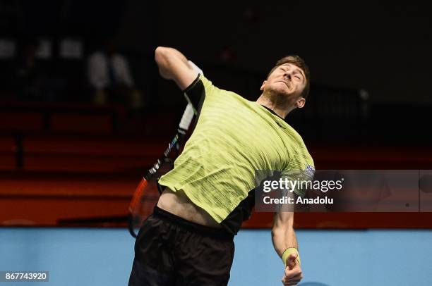 Marcelo Demoliner of Brazil in action against Pablo Cuevas of Uruguai and Rohan Boppana of India during Erste Bank Open 500 tournament doubles tennis...