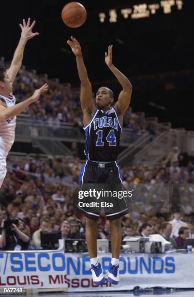 Guard Jason Parker of the Tulsa Golden Hurricanes takes a shot against the Kentucky Wildcats during the second round of the 2002 NCAA Division I...