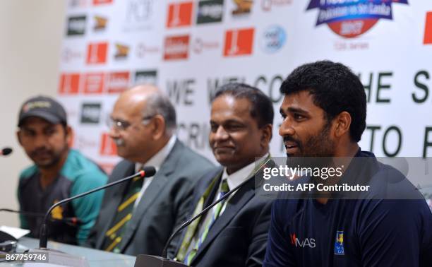 Sri Lankan cricket captain Thisara Perera speaks next to Sri Lanka Cricket President Thilanga Sumathipala , Chairman of Pakistan Cricket Board Najam...