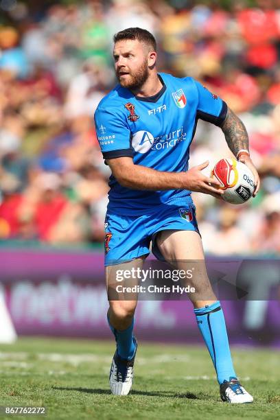 Nathan Brown of Italy passes during the 2017 Rugby League World Cup match between Ireland and Italy at Barlow Park on October 29, 2017 in Cairns,...