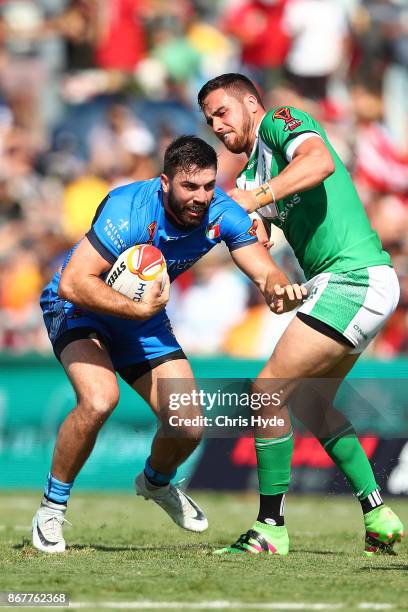 James Tedesco of Italy runs the ball during the 2017 Rugby League World Cup match between Ireland and Italy at Barlow Park on October 29, 2017 in...