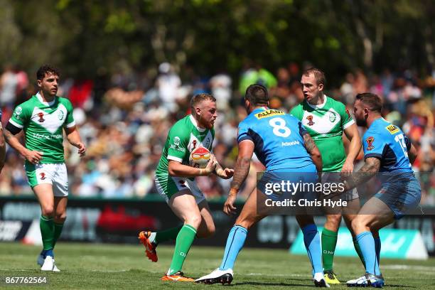Brad Singleton of Ireland iruns the ball during the 2017 Rugby League World Cup match between Ireland and Italy at Barlow Park on October 29, 2017 in...
