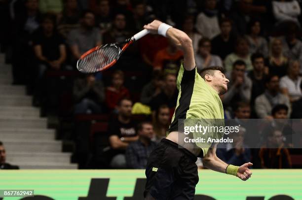 Marcelo Demoliner of Brazil in action against Pablo Cuevas of Uruguai and Rohan Boppana of India during Erste Bank Open 500 tournament doubles tennis...