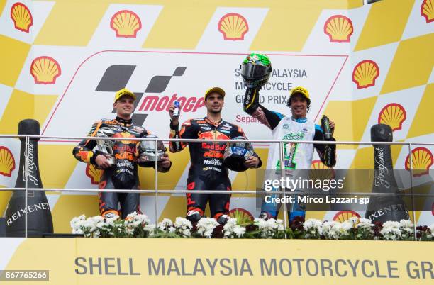 Brad Binder of South Africa and Red Bull KTM Ajo, Miguel Oliveira of Portugal and Red Bull KTM Ajo and Franco Morbidelli of Italy and EG 00 Marc VDS...