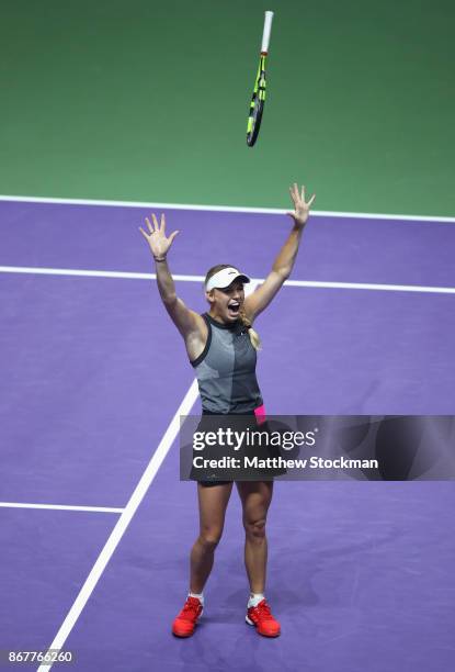 Caroline Wozniacki of Denmark celebrates victory in the Singles Final against Venus Williams of the United States during day 8 of the BNP Paribas WTA...