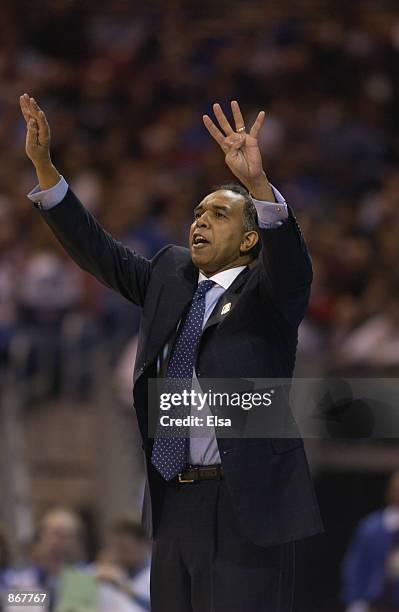 Head coach Tubby Smith of the Kentucky Wildcats yells to his team against the Tulsa Golden Hurricanes during the second round of the 2002 NCAA...