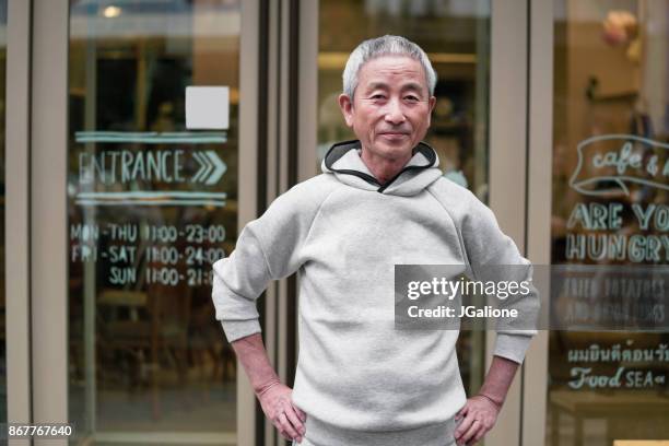 portrait of a senior japanese man - old man looking at camera stock pictures, royalty-free photos & images