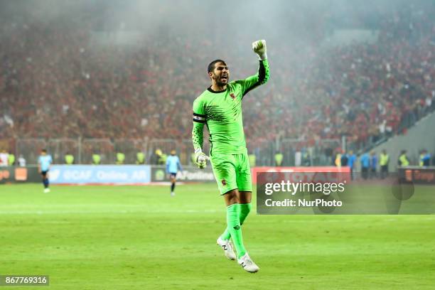 Al-Ahly's goalkeeper Sherif Ekramy reacts during the CAF Champions League final football match between Al-Ahly and Wydad Casablanca at the Borg El...