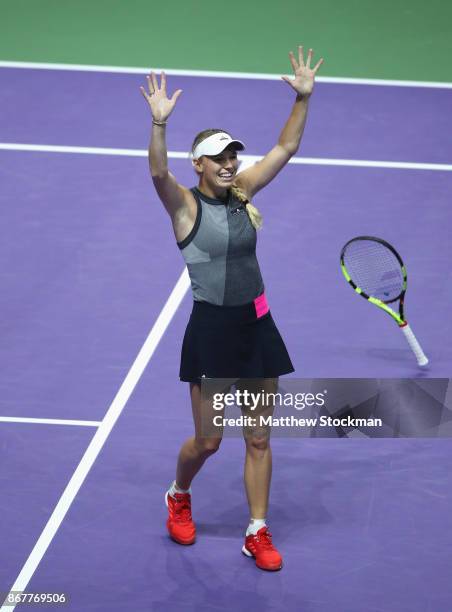 Caroline Wozniacki of Denmark celebrates victory in the Singles Final against Venus Williams of the United States during day 8 of the BNP Paribas WTA...