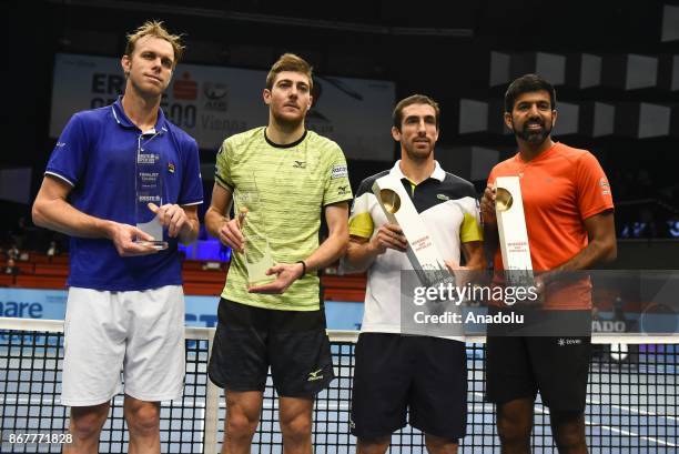 Sam Querrey of USA, Marcelo Demoliner of Brazil, Pablo Cuevas of Uruguai and Rohan Bopanna of India pose for a picture with their awards during Erste...