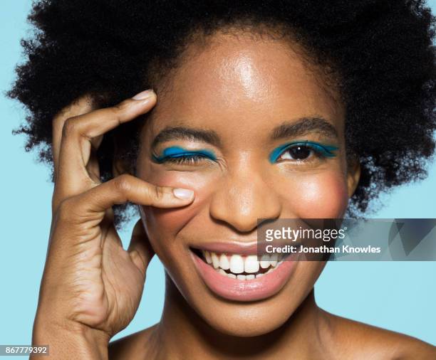 young female with blue eye make-up - eyeliner stock pictures, royalty-free photos & images