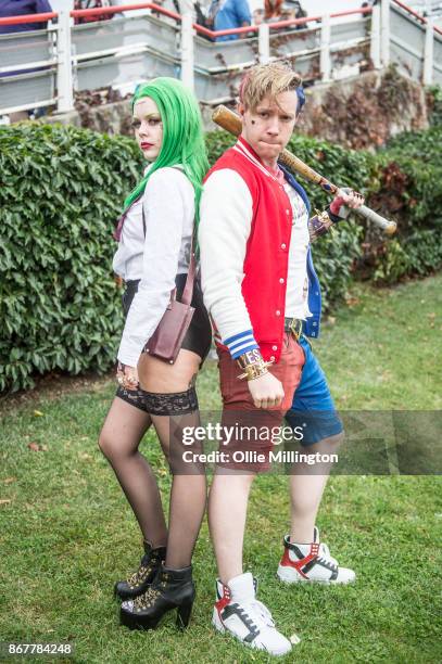 Cosplayer in character as a gender bend Suicide Squad Joker and a gender bend Suicide Squad Harley Quinn during Day 3 of the MCM London Comic Con...