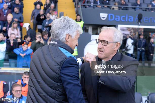 Head coach of Atalanta BC Gian Piero Gasperini shakes hands with Head coach of Udinese Luigi Delneri during the Serie A match between Udinese Calcio...