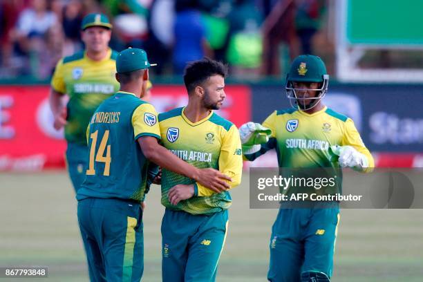 South African bowler JP Duminy celebrates the dismissal of Bangladesh batsman Sabbir Rahman during the second T20 cricket match between South Africa...