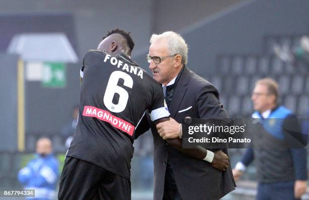 Head coach of Udinese Luigi Delneri issues instructions as his players Seko Mohamed Fofana during the Serie A match between Udinese Calcio and...