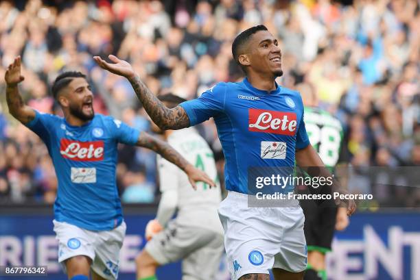 Lorenzo Insigne and Allan of SSC Napoli celebrate the 1-0 goal scored by Allan during the Serie A match between SSC Napoli and US Sassuolo at Stadio...