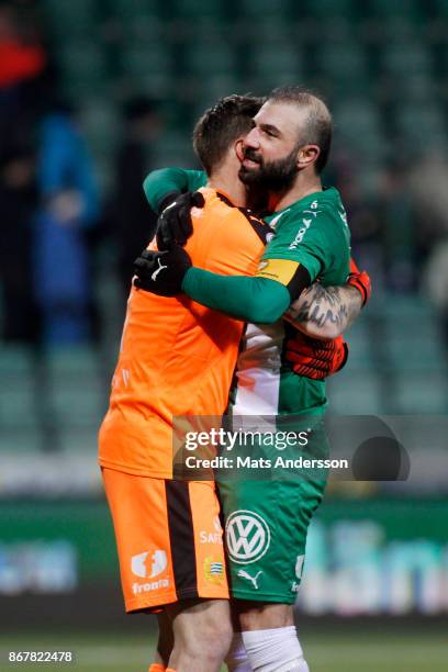 Kennedy Bakircioglu and Johan Wiland, goalkeeper of Hammarby IF celebrates after the victory during the Allsvenskan match between GIF Sundsvall and...