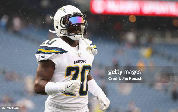 Desmond King of the Los Angeles Chargers warms up before a game against the New England Patriots at Gillette Stadium on October 29, 2017 in Foxboro,...