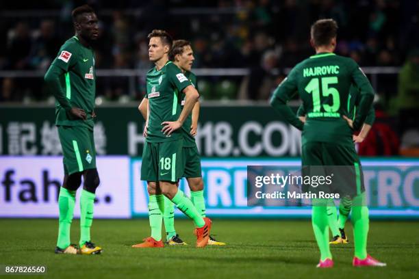 Players of Bremen react after the Bundesliga match between SV Werder Bremen and FC Augsburg at Weserstadion on October 29, 2017 in Bremen, Germany.