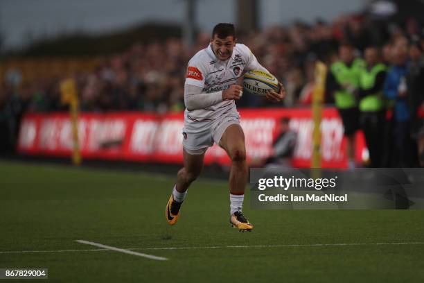 Jonny May of Leicester Tigers runs through to score his teams third try during the Aviva Premiership match between Newcastle Falcons and Leicester...