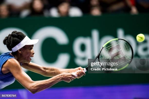 Venus Williams of the United States in action during her singles semi final match against Caroline Garcia of France on day 7 of the BNP Paribas WTA...