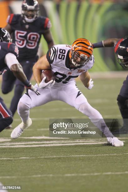 Tyler Eifert of the Cincinnati Bengals runs the ball upfield during the game against the Houston Texans at Paul Brown Stadium on September 14, 2017...