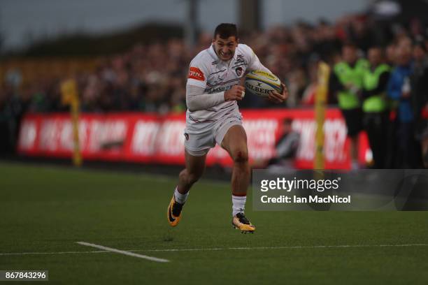 Jonny May of Leicester Tigers runs through to score his teams third try during the Aviva Premiership match between Newcastle Falcons and Leicester...