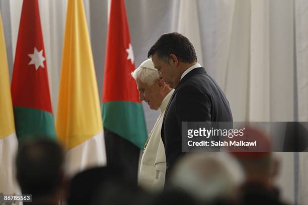 Pope Benedict XVI is welcomed by King Abdullah of Jordan and his wife Queen Rania, on his arrival, May 8, 2009 in Amman, Jordan. Pope Benedict XVI is...