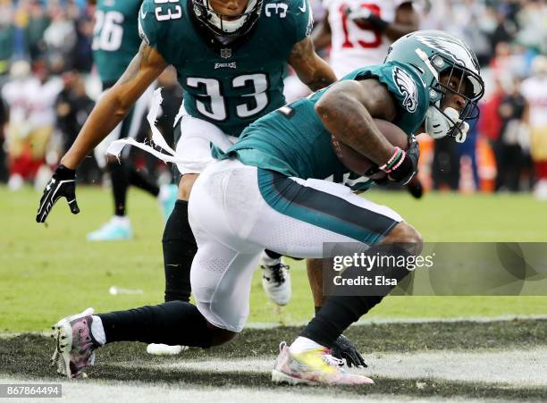 Jalen Mills of the Philadelphia Eagles scores a touchdown in the second quarter against the San Francisco 49ers on October 29, 2017 at Lincoln...