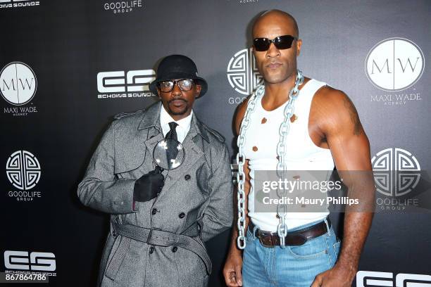 Keith Robinson and Lamonica Garrett arrive at A Haute Halloween at Riviera 31 at Sofitel on October 28, 2017 in Los Angeles, California.