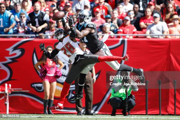 Vernon Hargreaves III of the Tampa Bay Buccaneers defends a pass intended for Devin Funchess of the Carolina Panthers in the first quarter of a game...