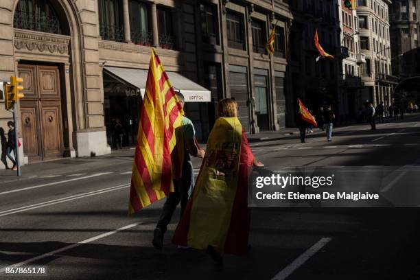 Protesters take part in a pro-unity demonstration on October 29, 2017 in Barcelona, Spain. Thousands of pro-unity protesters have gathered in...