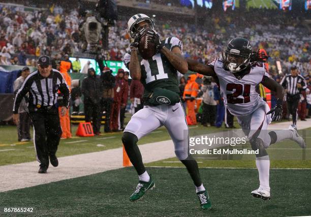Wide receiver Robby Anderson of the New York Jets scores a touchdown against cornerback Desmond Trufant of the Atlanta Falcons during the second...