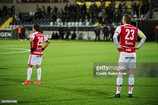 Dejected Romario Pereira Sipiao and Viktor Elm of Kalmar FF after their team's defeat during the Allsvenskan match between BK Hacken and Kalmar FF at...
