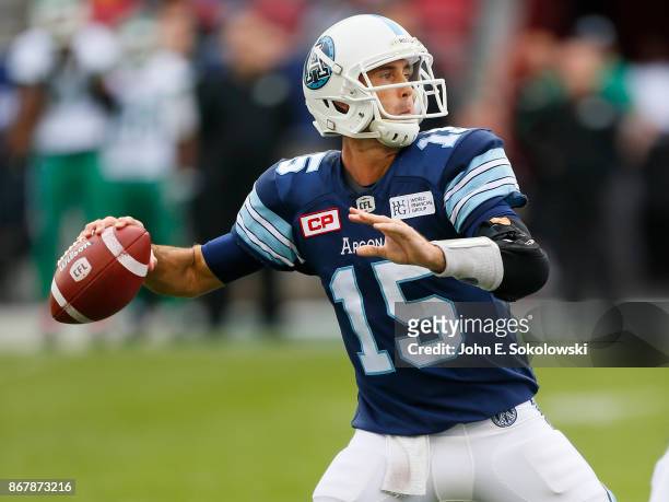 Ricky Ray of the Toronto Argonauts goes to throw a pass against the Saskatchewan Roughriders during a game at BMO field on October 7, 2017 in...