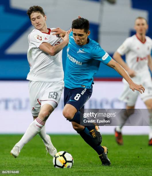 Matias Kranevitter of FC Zenit Saint Petersburg and Aleksei Miranchuk of FC Lokomotiv Moscow vie for the ball during the Russian Football League...