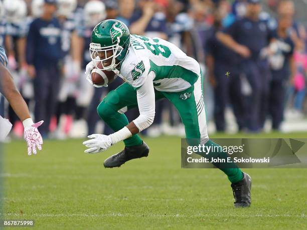 Duron Carter of the Saskatchewan Roughriders gains yards after a pass reception against the Toronto Argonauts during a game at BMO field on October...