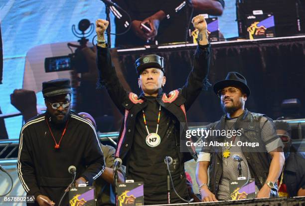 Will.i.am, Taboo and Apl.de.ap of The Black Eyed Peas attend day 2 of Stan Lee's Los Angeles Comic Con 2017 held at Los Angeles Convention Center on...