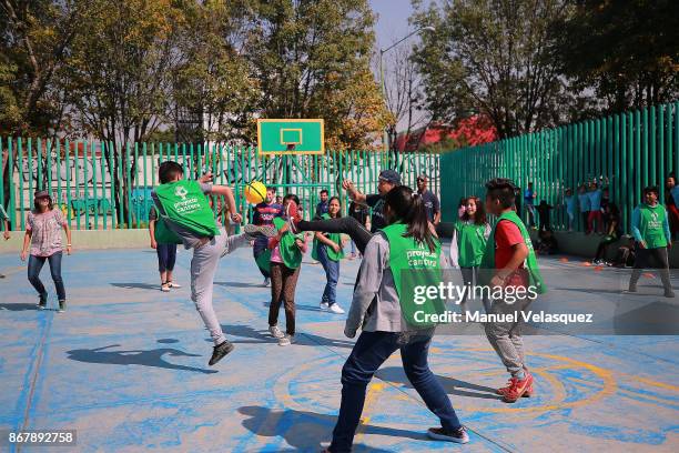 Coco Nogales Laureus Ambassador and surfing star plays soccer with the children during the Laureus Project visit to Proyecto Cantera on October 28,...
