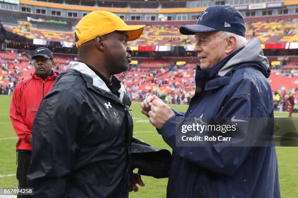 Cowboys owner Jerry Jones meets with Executive Director of the National Football League Players Association DeMaurice Smith prior to the start of the...