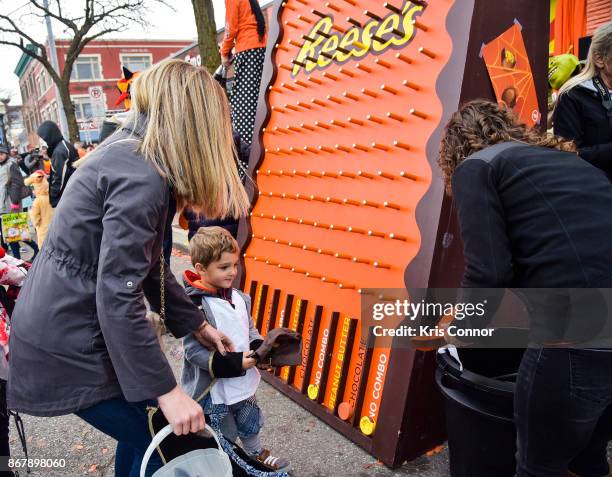 Attendees enjoy the celebration surrounding the unveiling of the first, exclusive samples of new Reese's Outrageous Bars at Royal Oak, MichiganÕs...